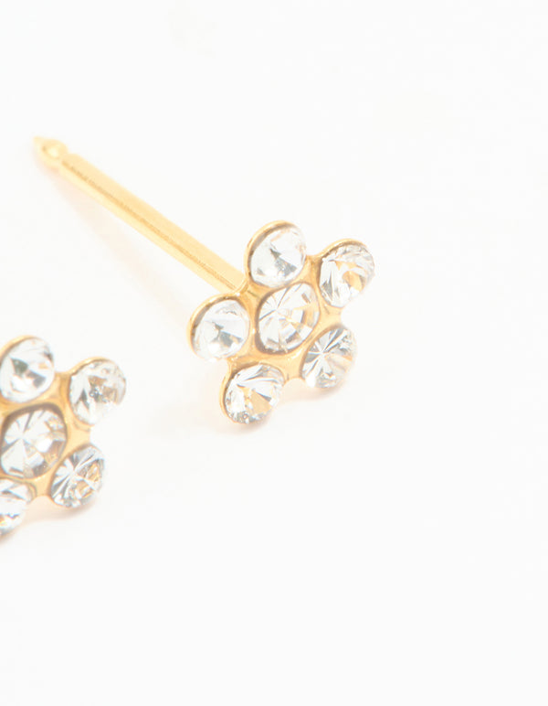 Elegantly designed 24K gold plated surgical stainless steel cubic zirconia daisy piercing stud with floral accents and dainty styling in clear post detail view