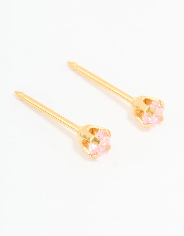 Showcasing 24K gold plated surgical steel 3MM pink cubic zirconia piercing studs front view