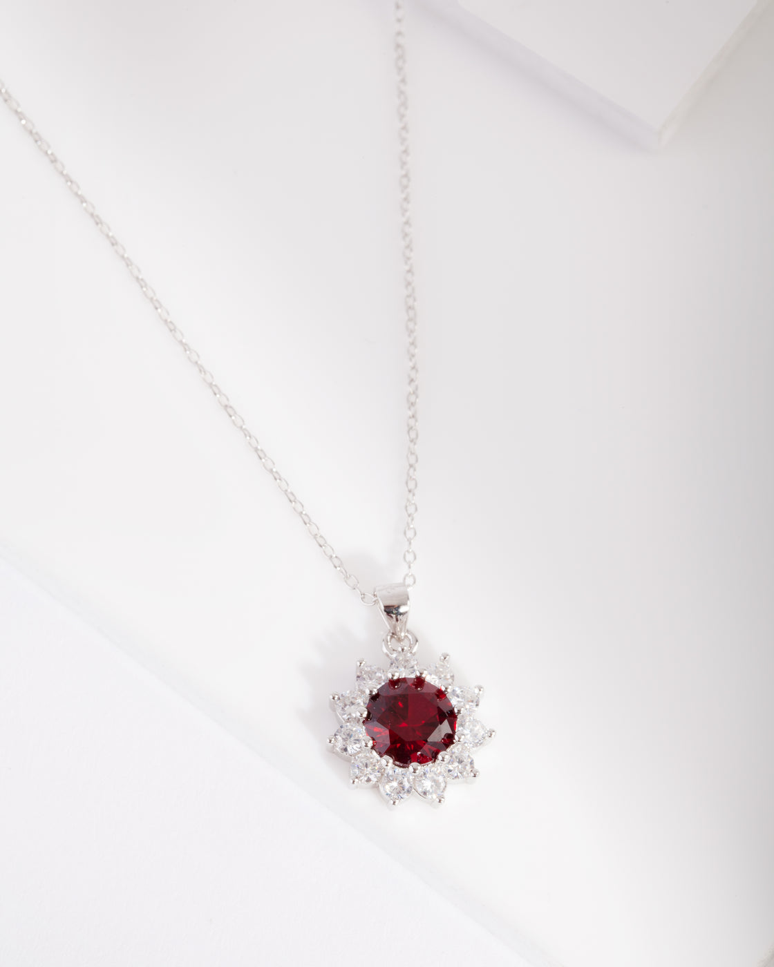 CG ST RH RUBY RND HALO NL