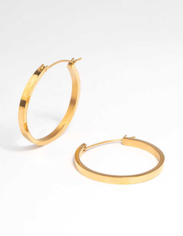 Showcasing waterproof medium flat hoop earrings crafted from stainless steel with a polished gold plated finish front view