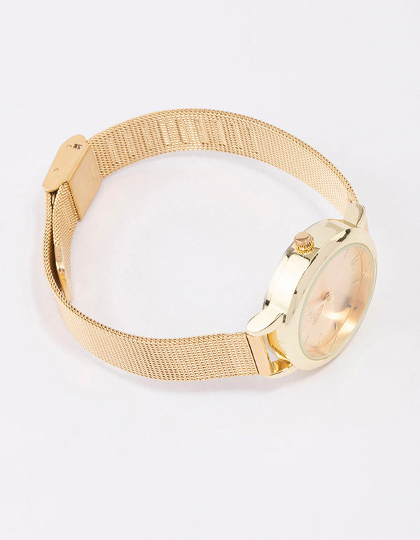 Explore this small simple mesh watch featuring roman dial look, round shape, analog design, and casual styling for women front view