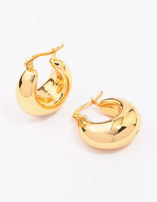 Showcasing waterproof gold plated stainless steel full bubble hoop earrings on ear view