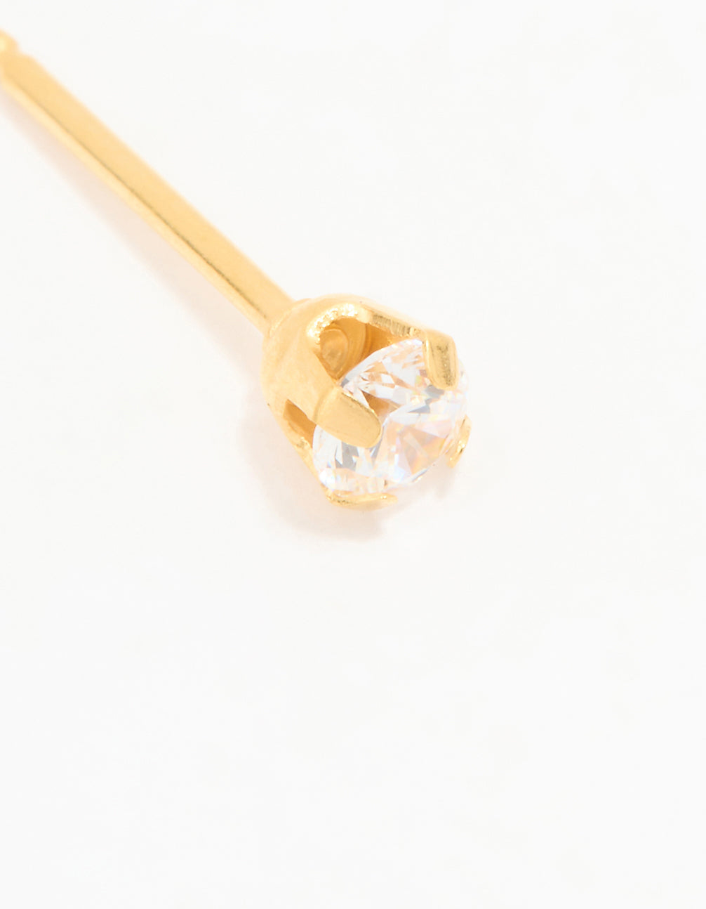 Highlighting cubic zirconia surgical stainless steel 3MM piercing stud with 24K gold plated close up view