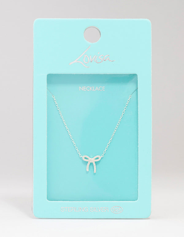 Elegant sterling silver cubic zirconia bow pendant necklace with dainty close up view