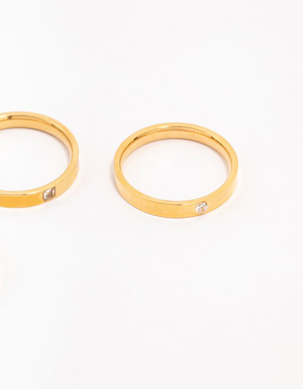Featuring waterproof gold plated stainless steel cubic zirconia stacking rings in a 3-pack side detail view