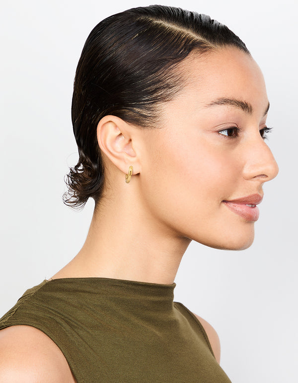 Crafted from waterproof gold plated stainless steel core clicker chunky earrings with hoop closure in 16 MM on model view