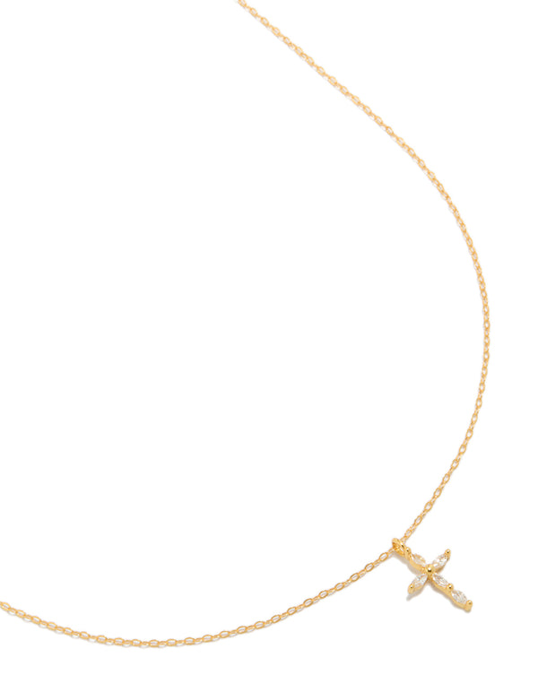 Showcasing a gold plated sterling silver cubic zirconia cross necklace close up view