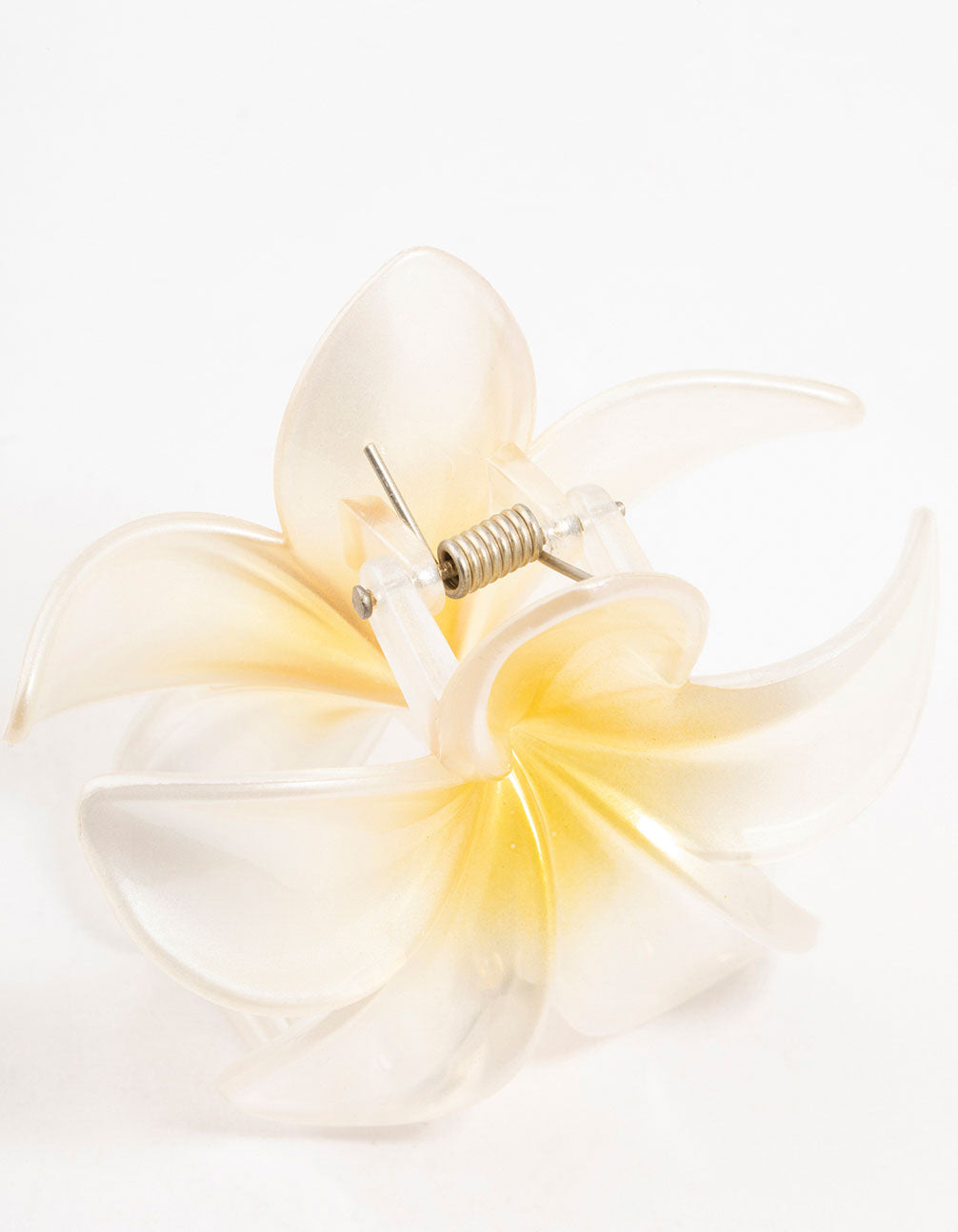 Designed with floral, this ombre plastic frangipani claw clip in white ivory yellow detail view