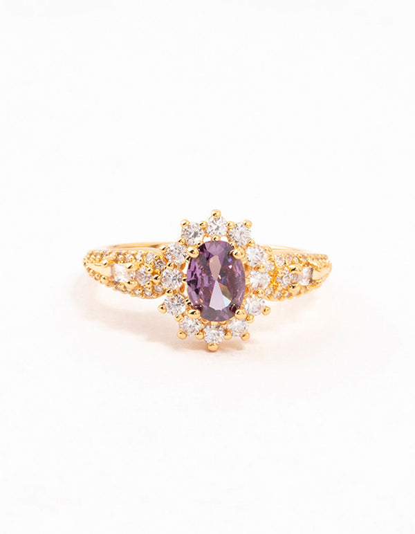Featuring a gold opulent purple cubic zirconia statement ring with halo cut crystal in clear front view