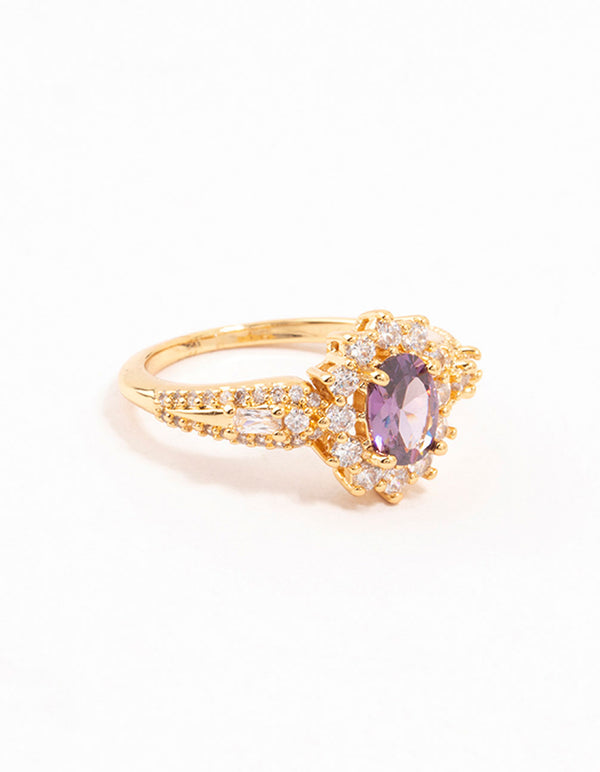 Crafted from gold opulent purple cubic zirconia statement ring featuring halo cut crystal in clear close up view