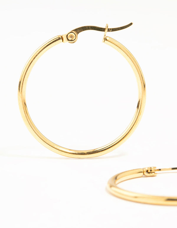 Detailed view of waterproof gold plated stainless steel fine hoop earrings with closure close up view