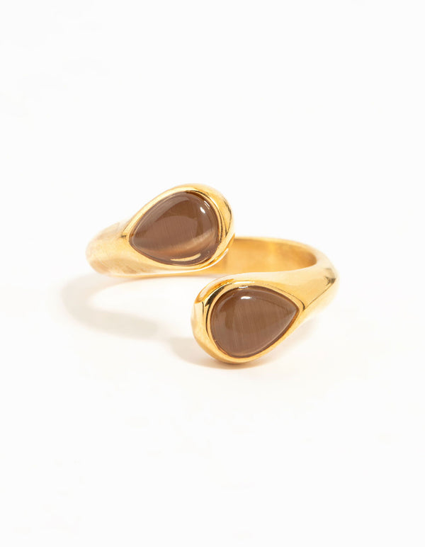 Presenting a waterproof gold plated stainless steel double pear stone ring with brown stones close up view