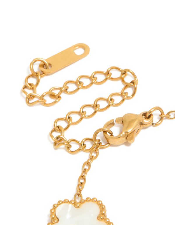 Presenting waterproof gold plated stainless steel floral petal charm bracelet in white closure detail view