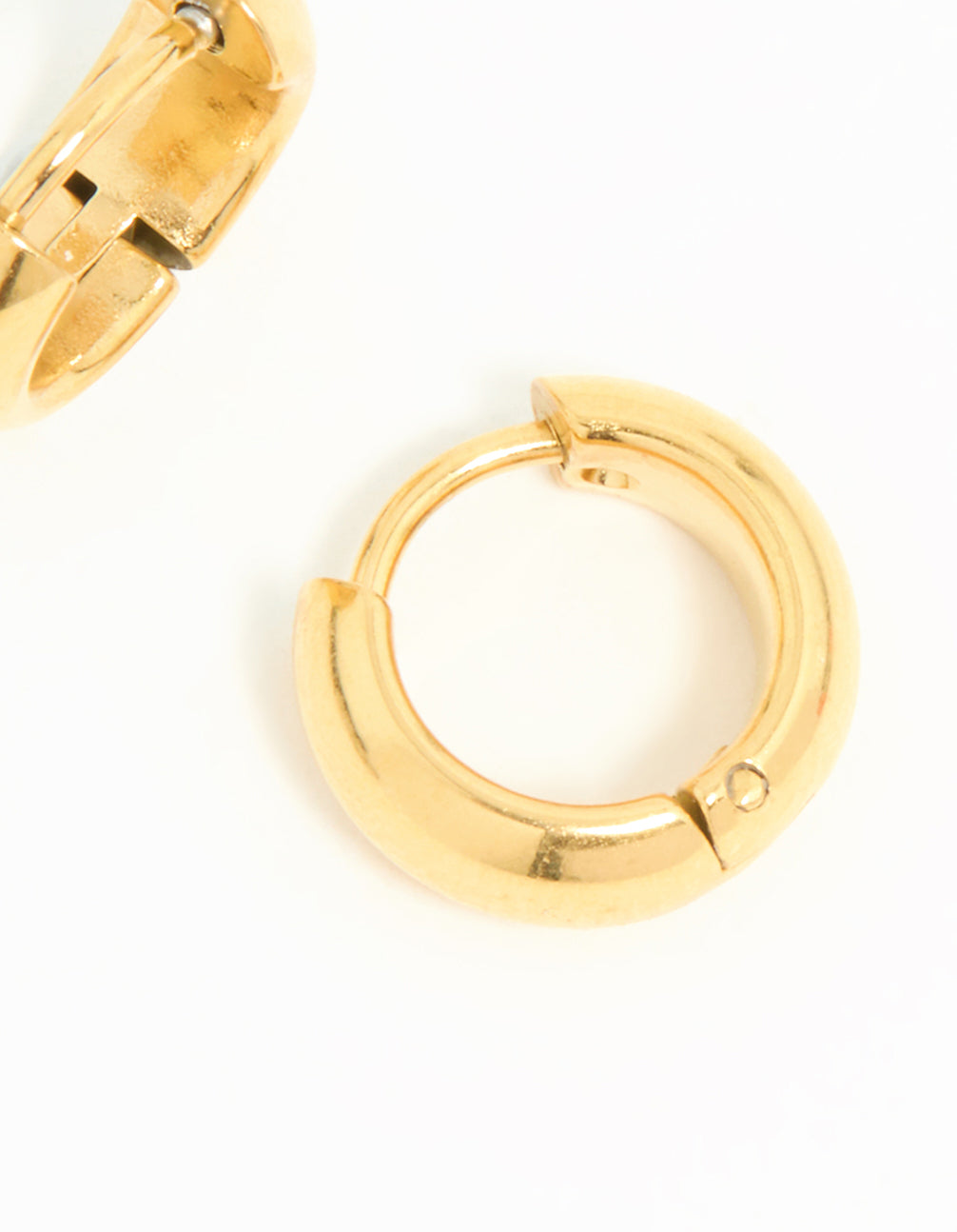 Highlighting waterproof gold plated stainless steel chubby huggie earrings with closure post detail view