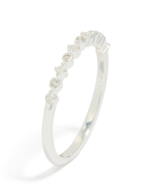 Featuring sterling silver construction, this circle pave ring in clear stone presents side detail view