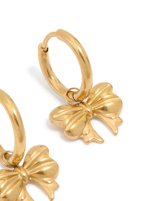 Designed with bow hoop closure in waterproof gold plated stainless steel post detail view