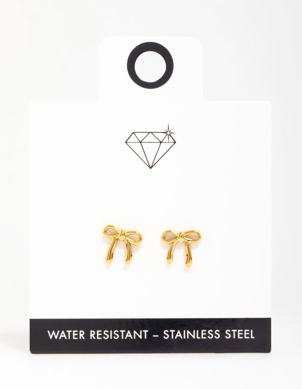 Showcasing dainty bow stud earrings crafted from waterproof gold plated stainless steel with enamel front view