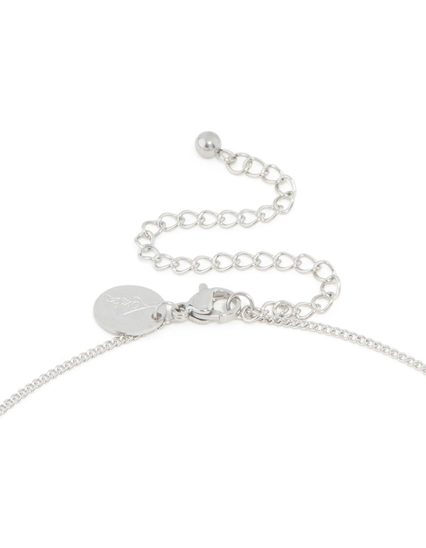 Presenting a waterproof stainless steel cubic zirconia pear pendant necklace in silver and clear clasp detail view
