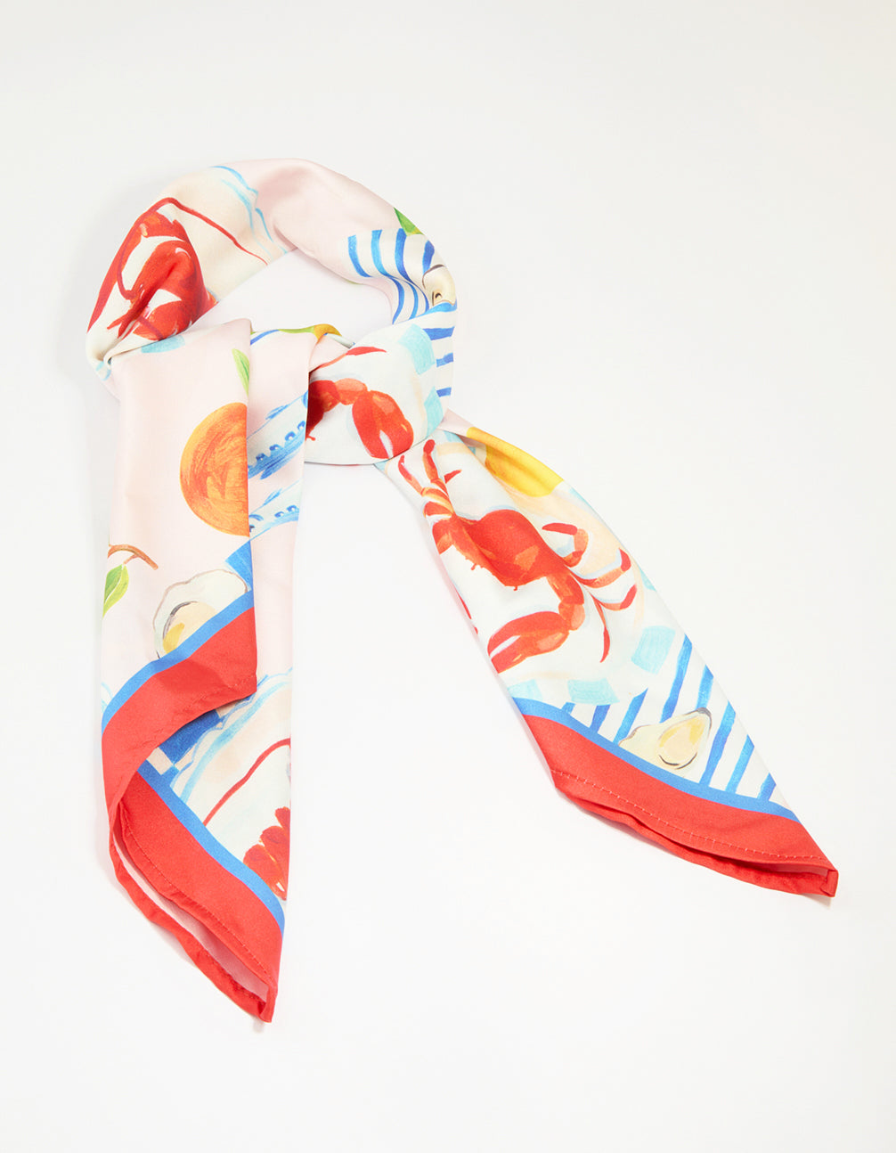 Discover this summer fabric scarf featuring food and fruit motifs with ocean-inspired novelty print in tomato, dodger blue, gold, and pale turquoise tones front view