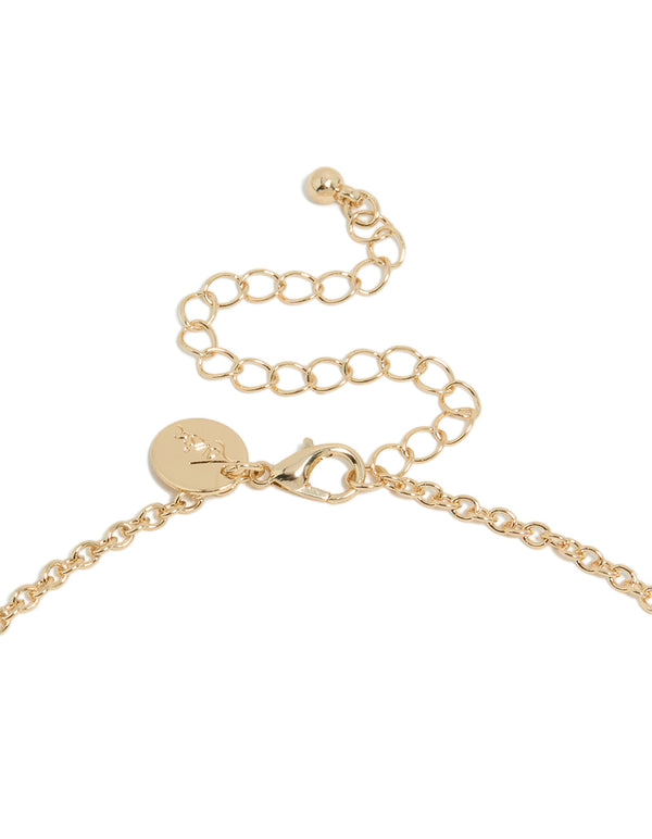Designed with gold red large stone and tube elements in crimson, this necklace highlights the clasp detail view