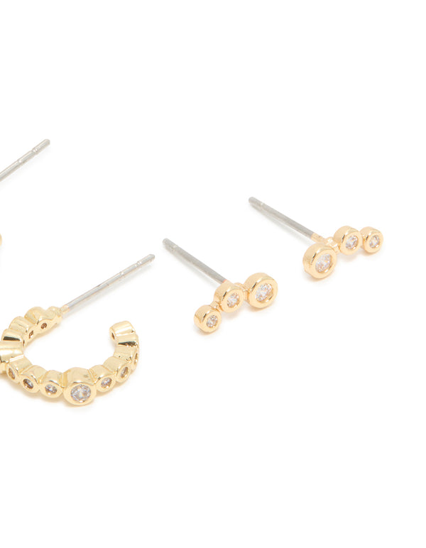 Crafted from waterproof gold plated stainless steel, these diamante stud earrings in a 4-pack feature huggie and stud closures post detail view