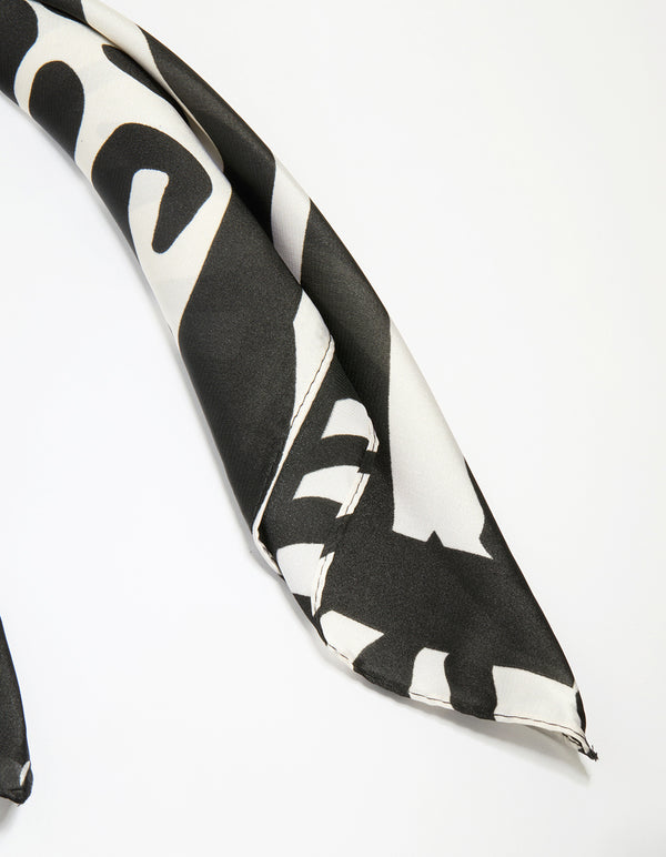 Featuring zebra print fabric in black and white with statement styling detail view