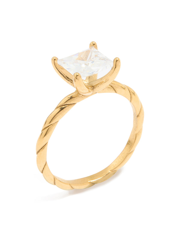 Showcasing a waterproof gold plated stainless steel cubic zirconia square ring with twisted band side detail view