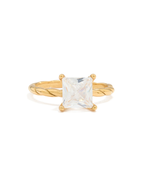 Crafted from waterproof gold plated stainless steel with cubic zirconia square stone and twisted band close up view