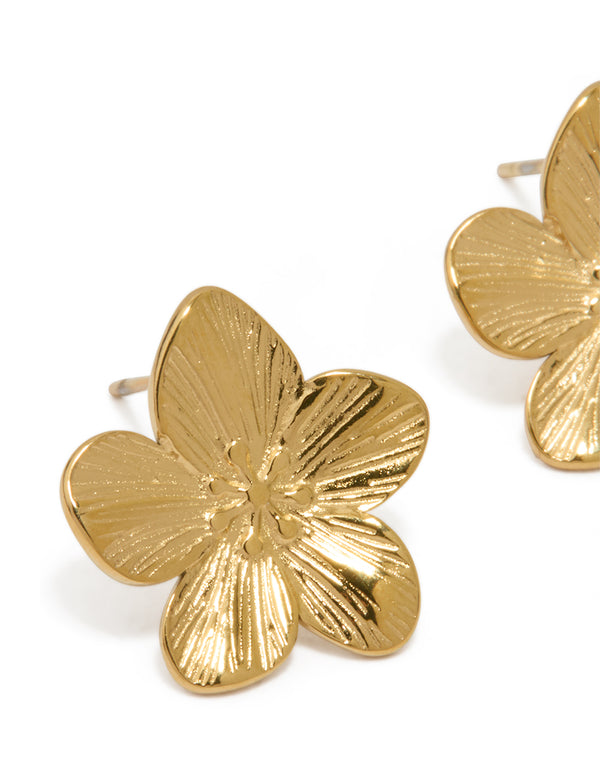 Showcasing waterproof stud earrings with floral design in gold plated stainless steel close up view