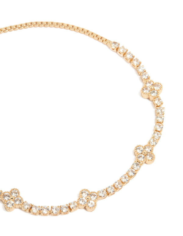 Crafted from cubic zirconia with floral design in gold close up view