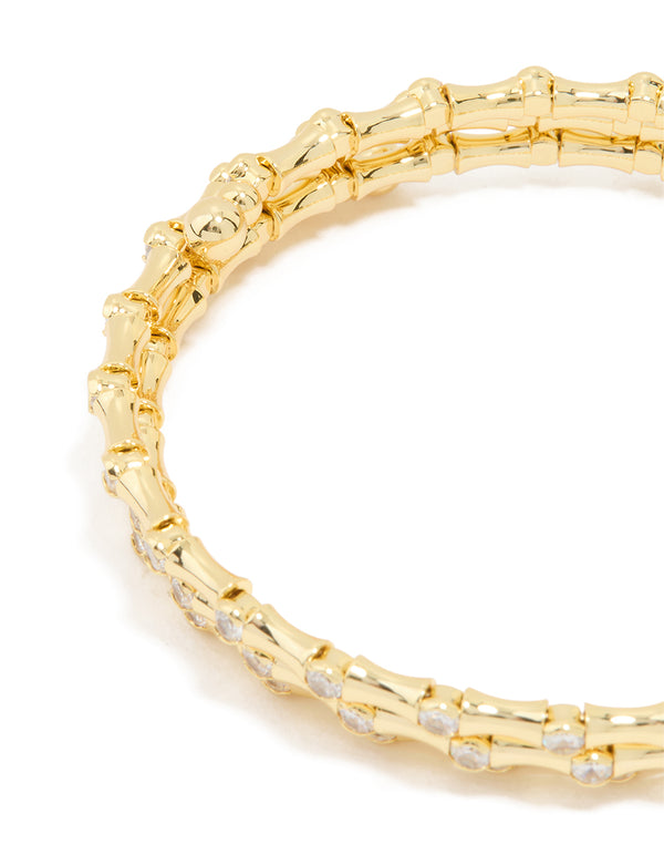 Featuring this gold plated diamante spiral bangle closure detail view