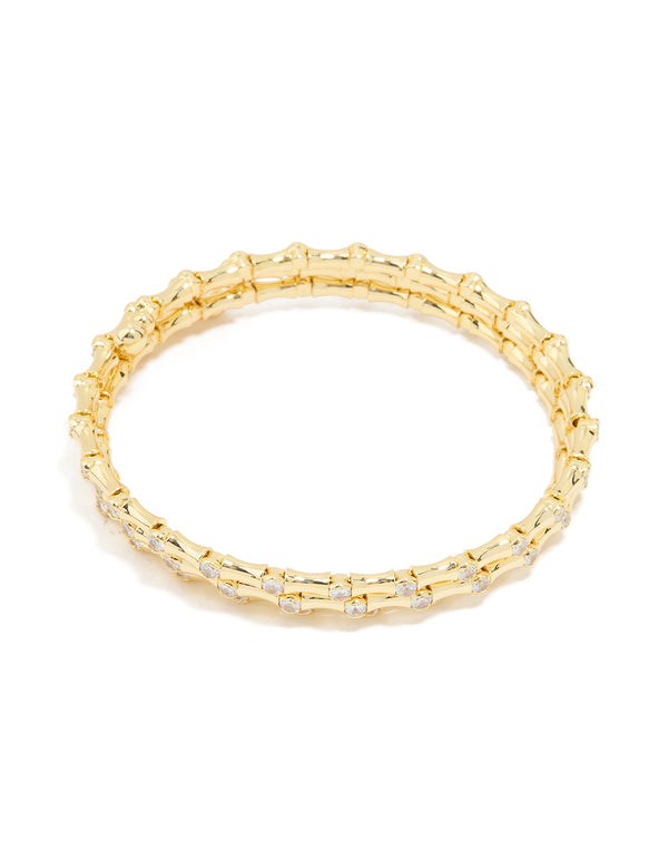 Showcasing this gold plated diamante spiral bangle front view