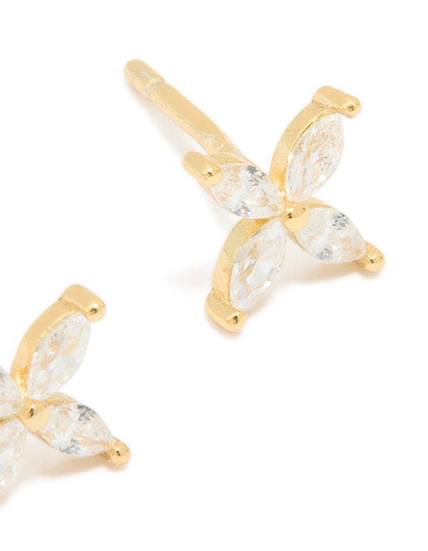 Highlighting waterproof floral stainless steel stud earrings with cubic zirconia in gold plated finish and clear accents post detail view