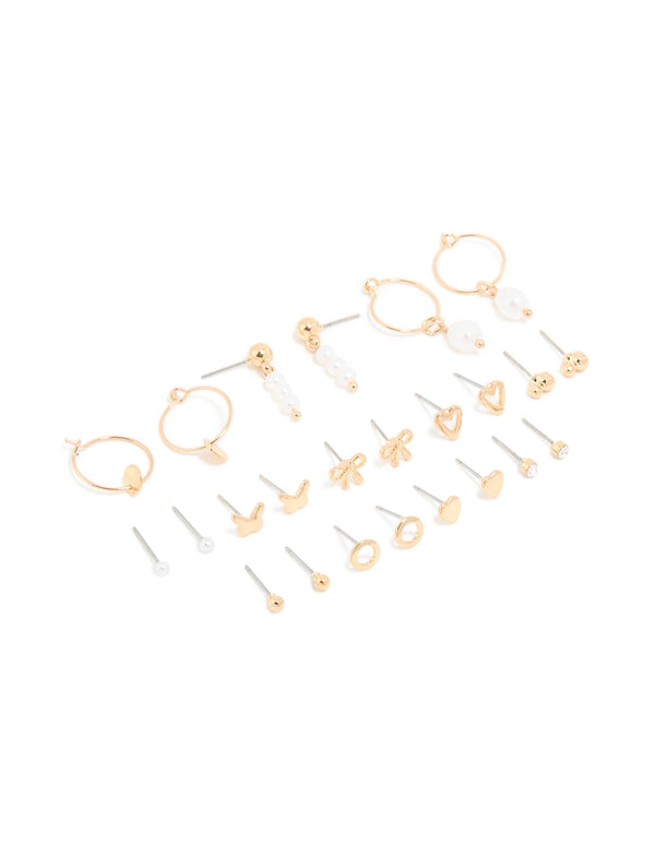 Showcasing a 12-pack of dainty stud earrings featuring bow, butterfly, heart, charm and pearl accents in gold front view