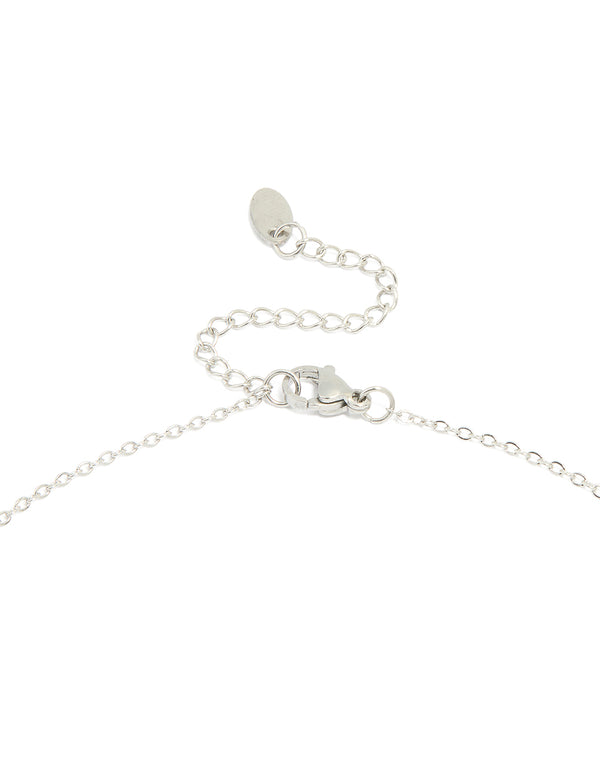A silver plated small pebble pendant necklace in a statement style clasp detail view