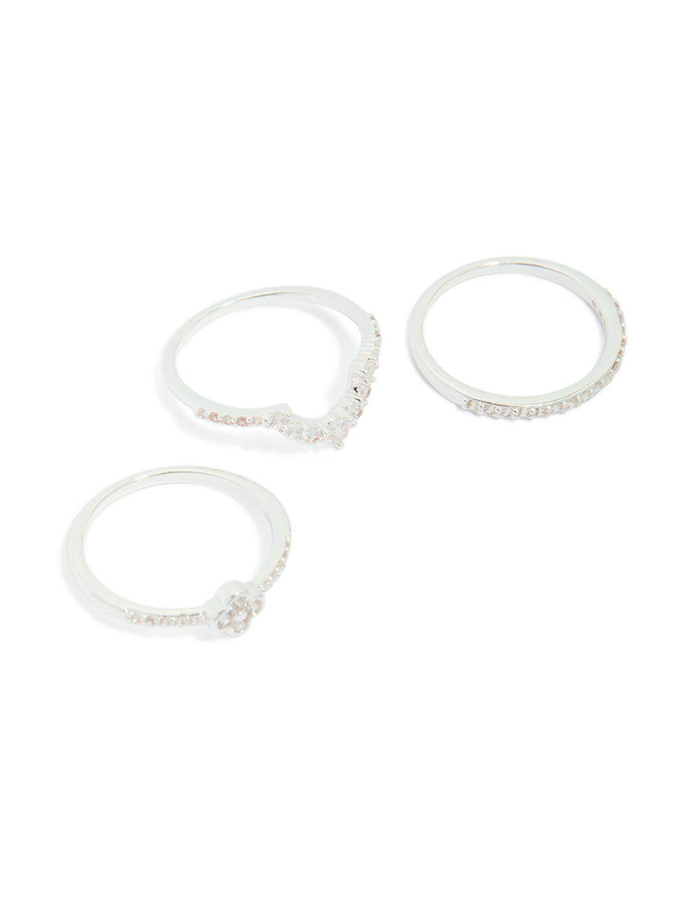 Showcasing silver plated cubic zirconia dainty flower and band stacking rings 3-pack in white front view