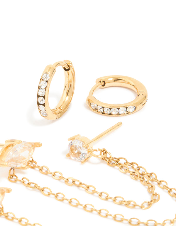 Elegantly designed waterproof gold plated stainless steel cubic zirconia marquise clicker and studs in a 3-pack and huggie closure on ear view