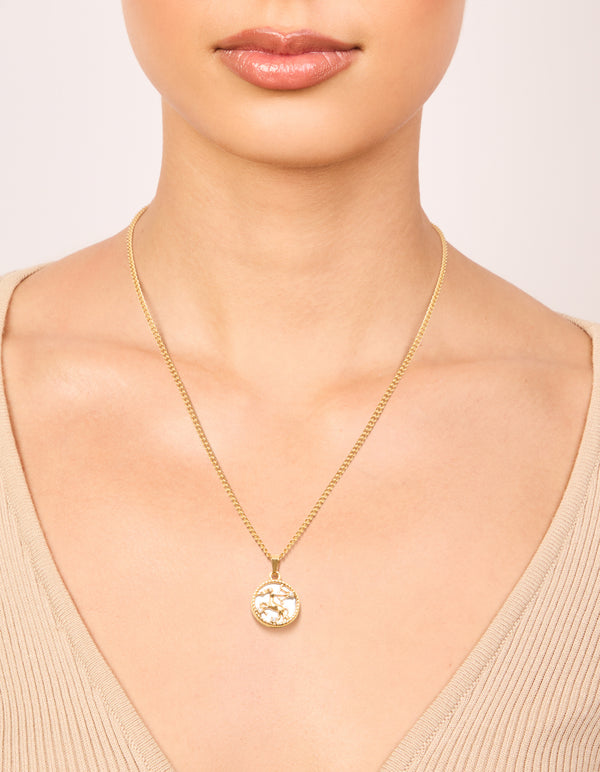 Showcasing a waterproof gold plated stainless steel necklace with a Sagittarius star sign pendant on neck view