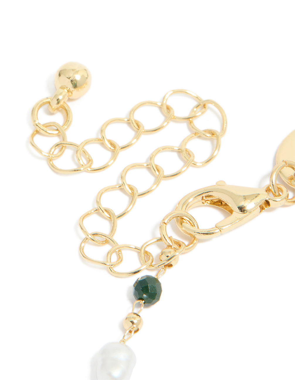 Presenting a gold plated bracelet featuring green beads and pearls closure detail view