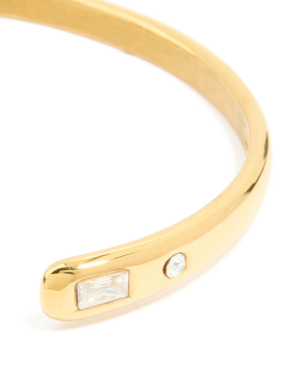 Highlighting celestial star and diamante stone settings in waterproof gold plated stainless steel dainty cuff close up view