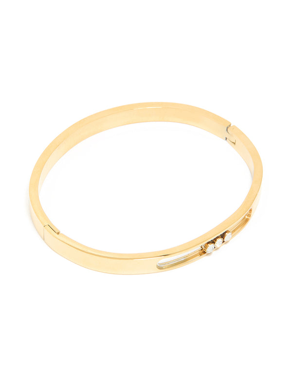 Discover this waterproof gold plated stainless steel diamante hinged bangle featuring white crystal accents front view