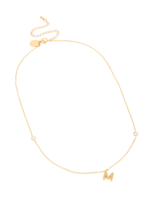 Stylish waterproof letter M initial pendant necklace in gold plated stainless steel in dainty front view