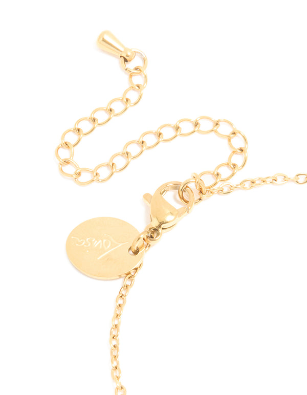 Presenting a waterproof gold plated stainless steel bracelet featuring pink cubic zirconia closure detail view