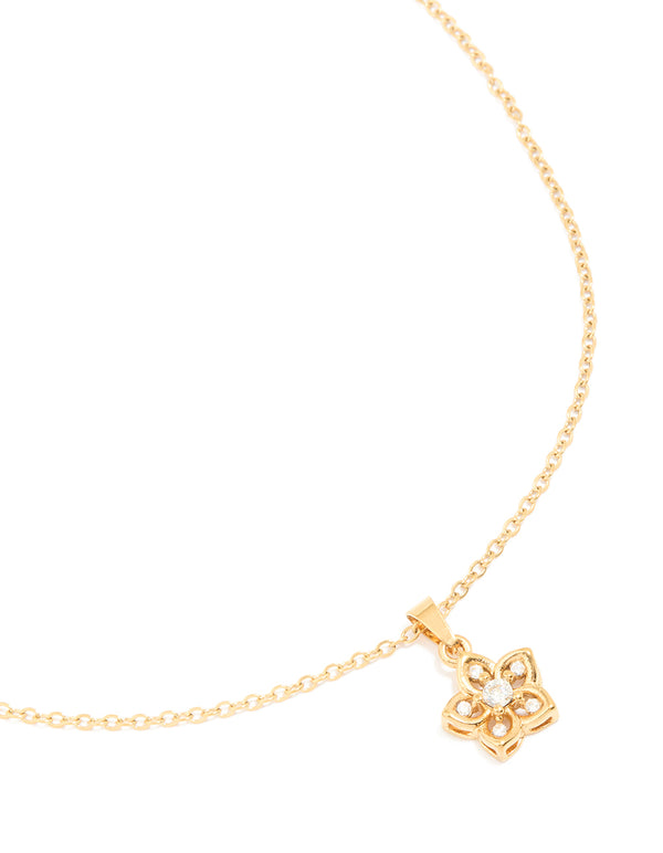 Beautifully designed waterproof gold plated stainless steel cubic zirconia flower outline pendant necklace close up view