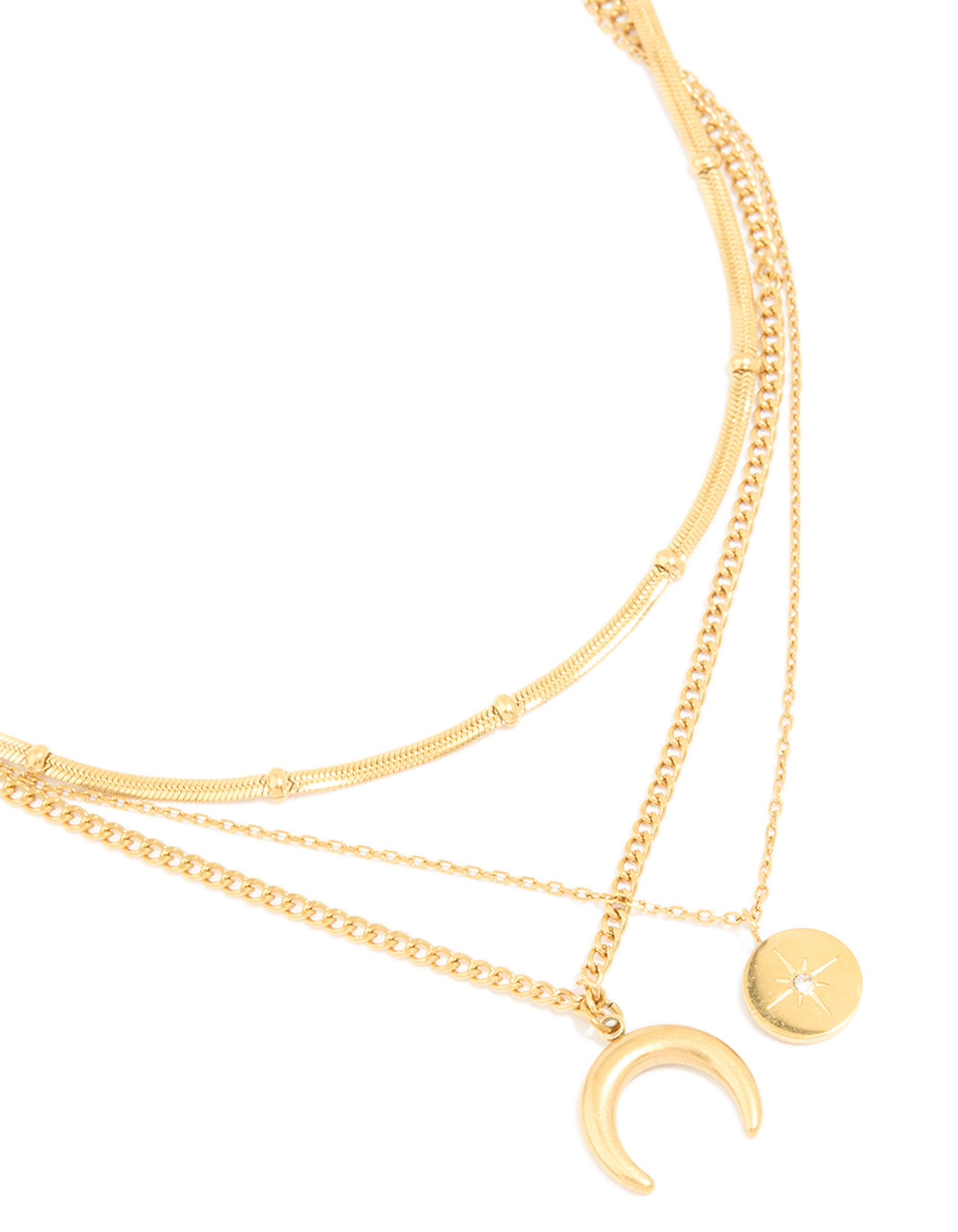 Showcasing a waterproof layered necklace crafted from gold plated stainless steel with celestial charm pendants featuring star, moon and balls close up view