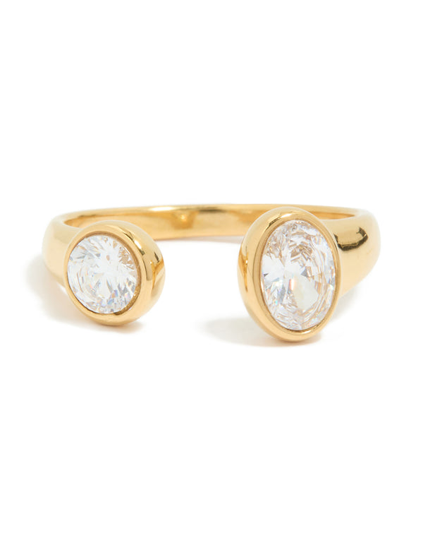 Presenting a waterproof gold plated stainless steel open ring with oval and round cubic zirconia close up view