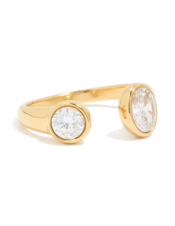 Showcasing a waterproof open ring crafted from stainless steel with oval and round stone cut in gold plated finish front view