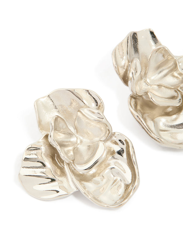 Featuring waterproof stainless steel statement flower stud earrings with floral design in silver close up view