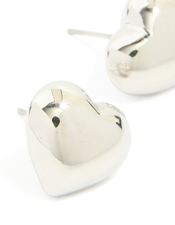 Presenting small chunky heart stud earrings made from waterproof stainless steel in silver close up view