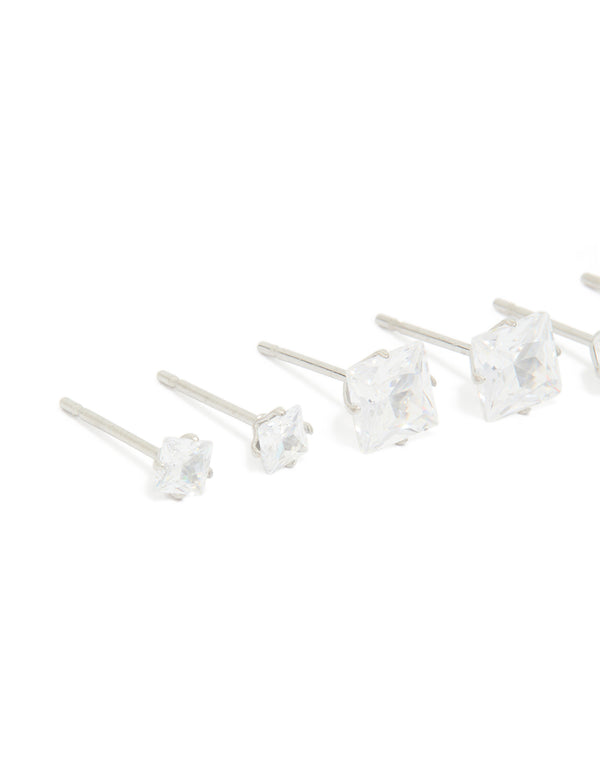 Designed with waterproof stainless steel cubic zirconia square stud earrings in a 3-pack featuring silver and clear stones close up view